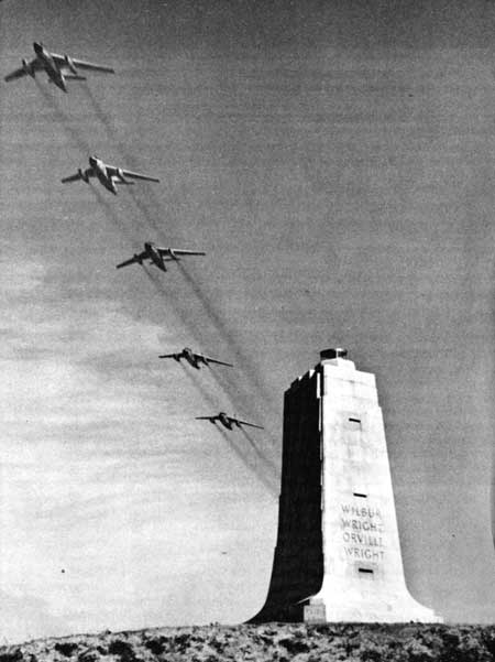 aircraft flying over memorial shaft