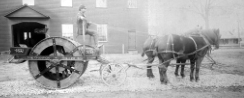 horse-drawn equipment and hand tools constructing roads