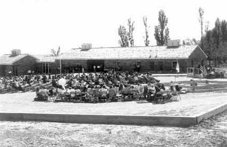 visitor center and crowd gathered for its dedication